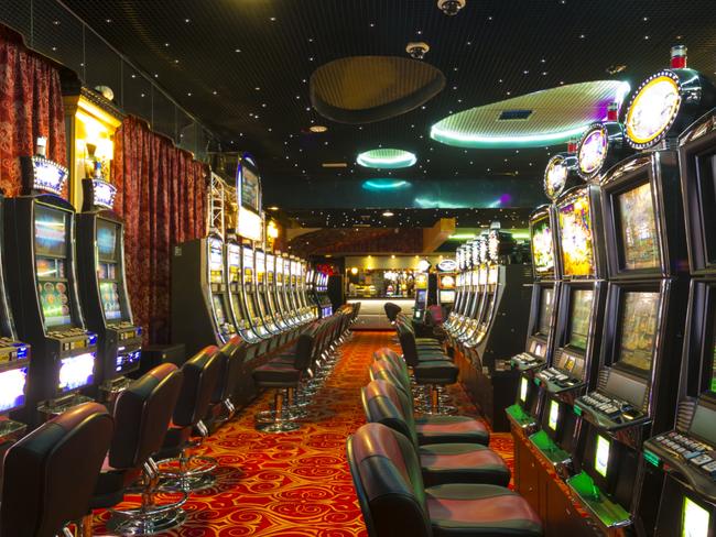 A Slot machines room in an empty  Casino just before the opening time.