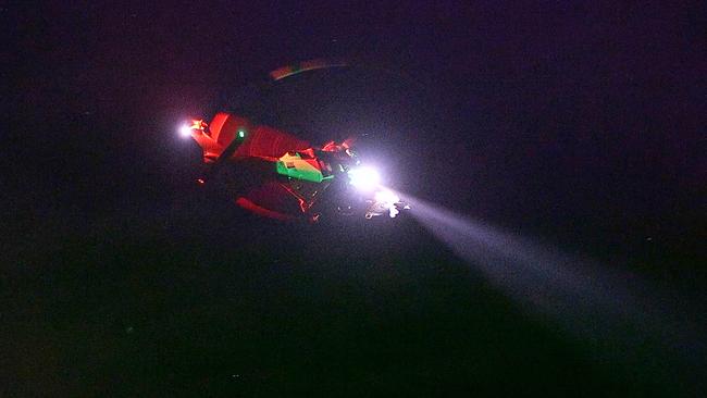Authorities search for man washed off the southern breakwall at Coffs Harbour. Photo by Frank Redward