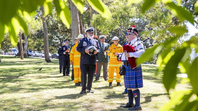 Members of the Flag and Headress Party at the memorial. Picture: NCA NewsWire / Jenny Evans