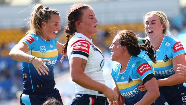 GOLD COAST, AUSTRALIA - AUGUST 25: Evania Pelite of the Titans celebrates a try during the round five NRLW match between Gold Coast Titans and Sydney Roosters at Cbus Super Stadium on August 25, 2024 in Gold Coast, Australia. (Photo by Chris Hyde/Getty Images)