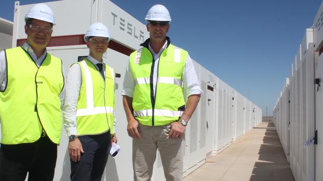 Tesla’s Mark Twidell, Neoen’s Garth Heron and Energy Minister Dan van Holst Pellekaan at the Hornsdale Power Reserve. Picture: Chris Russell