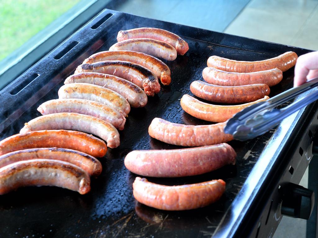 Even the humble sausage sizzle is not immune to inflation.