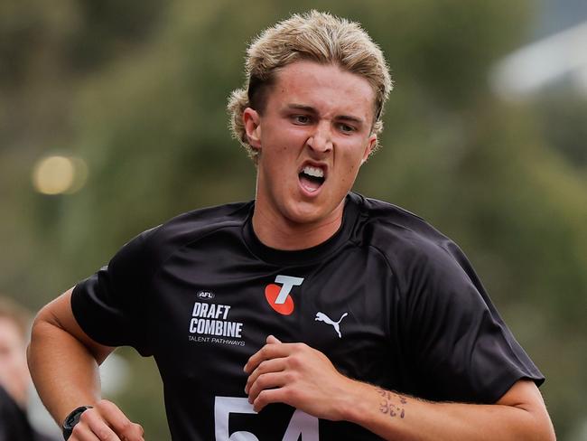 MELBOURNE, AUSTRALIA - OCTOBER 04: Bo Allan (Western Australia - Peel Thunder) crosses the finish line during the 2km time trial during the Telstra AFL National Draft Combine Day 1 at the AIA Centre on October 04, 2024 in Melbourne, Australia. (Photo by Dylan Burns/AFL Photos via Getty Images)