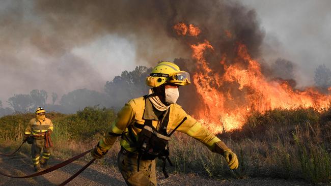 Firefighters battle a blaze in the northern Spanish province of Zamora. Picture: AFP