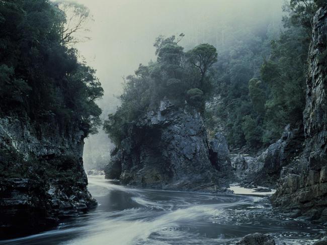 Photographer Perter Dombrovskis’s iconic image, Morning Mist, Rock Island Bend, which was the defining symbol of the successful campaign to prevent the damming of the Franklin River in 1978. Picture: Courtesy of National Library of Australia and Estate of Peter Dombrovskis