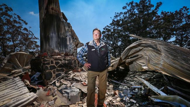 Binna Burra Lodge's Steve Noakes was devastated by the destruction of the once picturesque lodge which lay in ruins. Picture: Nigel Hallett