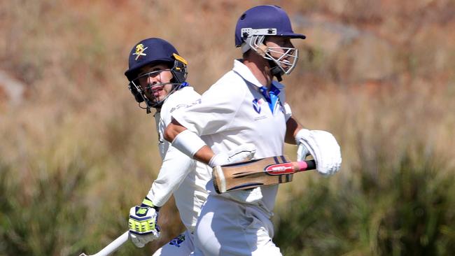 Chris Spinella and Tim Grant in action for St Bernard’s.