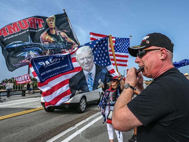 Supporters of former US President Donald Trump gather near his residence at Mar-a-Lago in Palm Beach, Florida. Picture: AFP