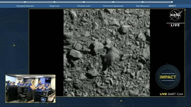 Dimorphos just before the Double Asteroid Redirection Test (DART) made impact with the asteroid, as watched by the team (bottom left) at DART headquarters in Laurel, Maryland. Picture: AFP