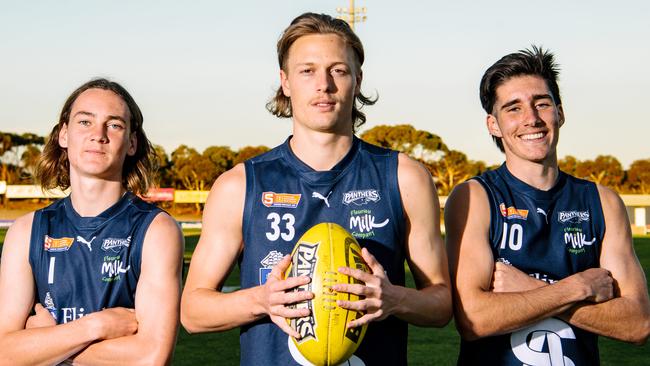 South Adelaide under-18s Isaac Birt, 17, Arlo Draper, 18, and Dylan Brown, 17, at South Adelaide Football Club ahead of the SANFL live stream preview in Adelaide, April 27, 2021. (The Advertiser/ Morgan Sette)