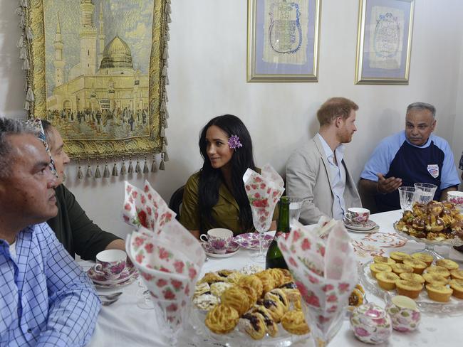 Britain's Prince Harry, and Meghan, Duchess of Sussex, have afternoon tea during a walkabout in Bo-Kaap, Cape Town. Picture: Courtney Africa/African News Agency/AP