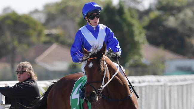 Jockey Kerrin McEvoy returns to scale after riding Miss Fabulass to victory at the Canterbury Park Racecourse. Picture: AAP Image/Simon Bullard