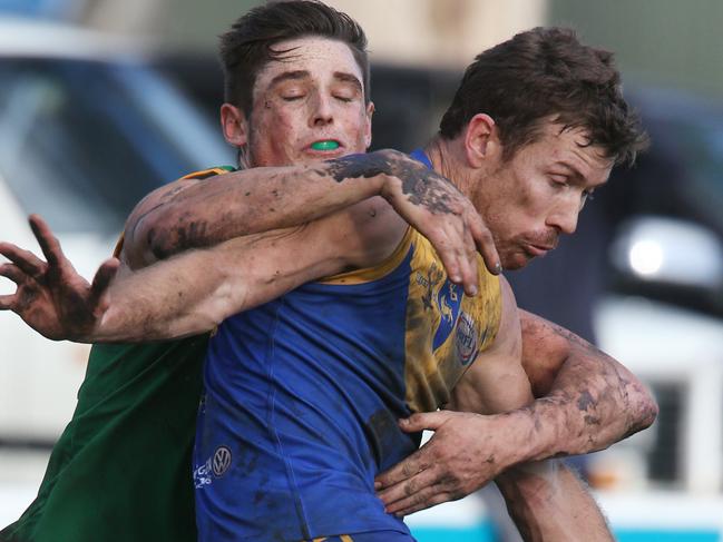 Football WRFL: Deer Park V Spotswood. at Deer Park.. Spotswood 13 Shaun Ross tackles Deer Park 26 Corey Brown Picture: Mark Wilson