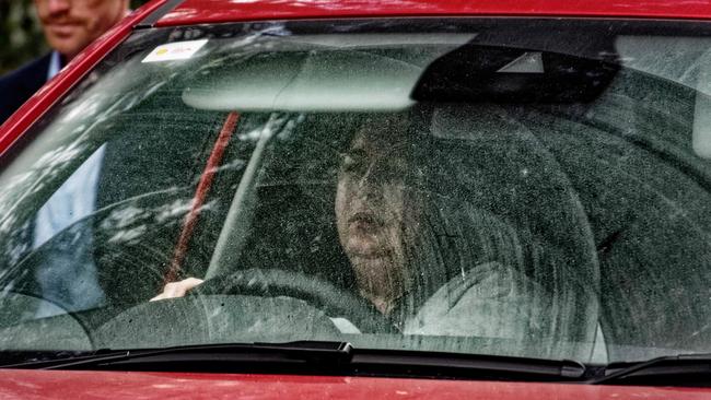 Mushroom death suspect Erin Patterson behind the wheel on Tuesday. Picture: Valeriu Campan