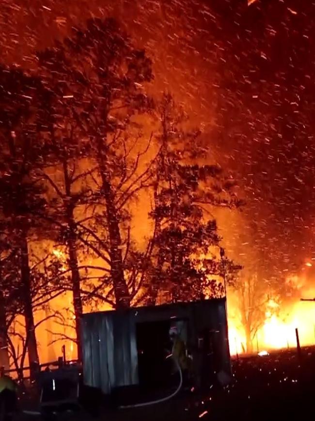 Braddocks Rd, Orangeville, where properties came under ember attack and crown fires across tree tops. Picture: Fire and Rescue NSW