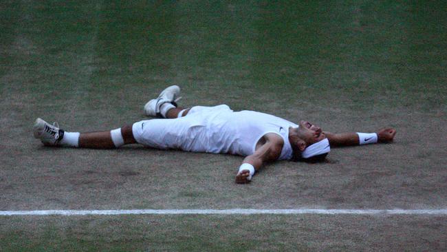 Rafael Nadal celebrates after beating Roger Federer in five sets to win the 2008 men’s singles title at Wimbledon.