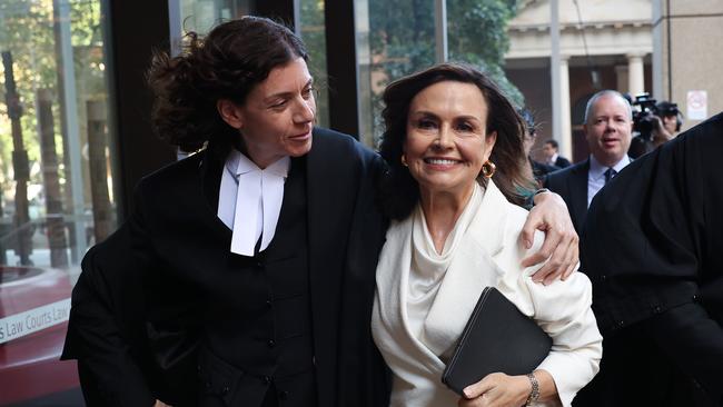 Barrister Sue Chrysanthou SC hugs Lisa Wilkinson as they emerge from court on April 15. Picture: Getty Images