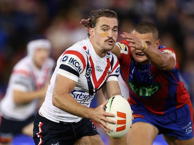 NEWCASTLE, AUSTRALIA - APRIL 11: Connor Watson of the Roosters runs the ball during the round six NRL match between Newcastle Knights and Sydney Roosters at McDonald Jones Stadium, on April 11, 2024, in Newcastle, Australia. (Photo by Cameron Spencer/Getty Images)