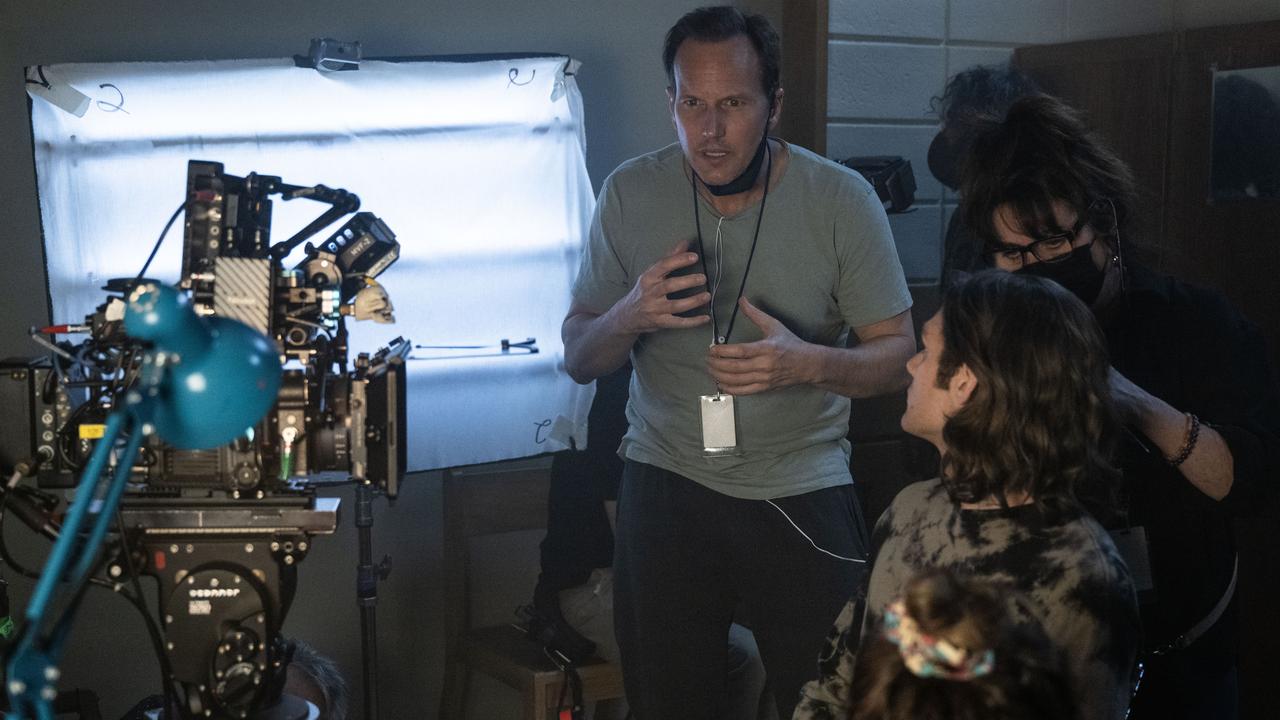 Director/Actor Patrick Wilson and Ty Simpkins on the set of Insidious: The Red Door