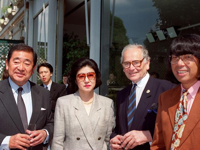 Pierre Cardin (second from right) with Kenzo (far right) after he was awarded the medal of the Holy Treasure, Japan’s highest distinction. Picture: AFP