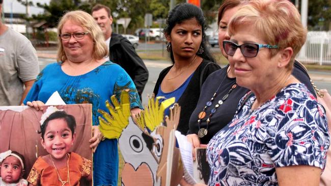 GALAH OCCASION: Supporters took paper cockatoos to the demo and said "Bring them home to Bilo”. INSET: The detained children. Picture: Matthew Melvin