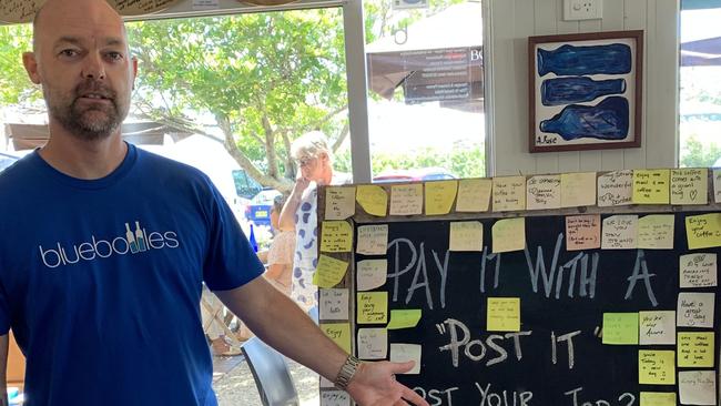 Weiss with the “Pay it with a Post it” sign. Picture: Matt Gazy