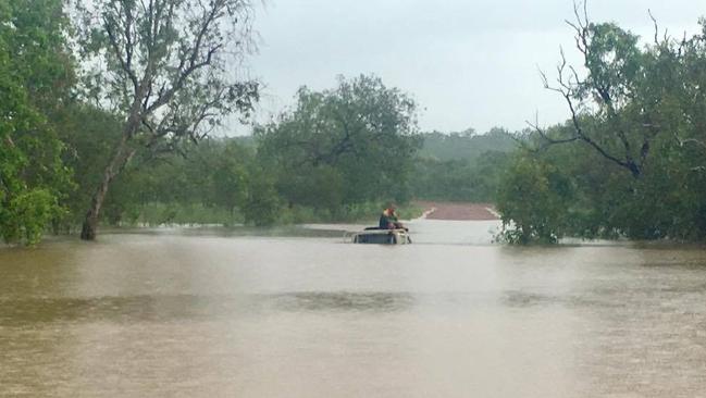 A 4wd became stuck in the middle of a flooded section of Marrakai Rd after the driver attempted to cross. PICTURE: Supplied