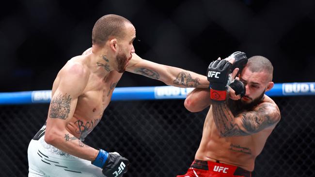 Sean Woodson (left) and Charles Jourdain fought a tight contest all the way. (Photo by Vaughn Ridley / GETTY IMAGES NORTH AMERICA / Getty Images via AFP)