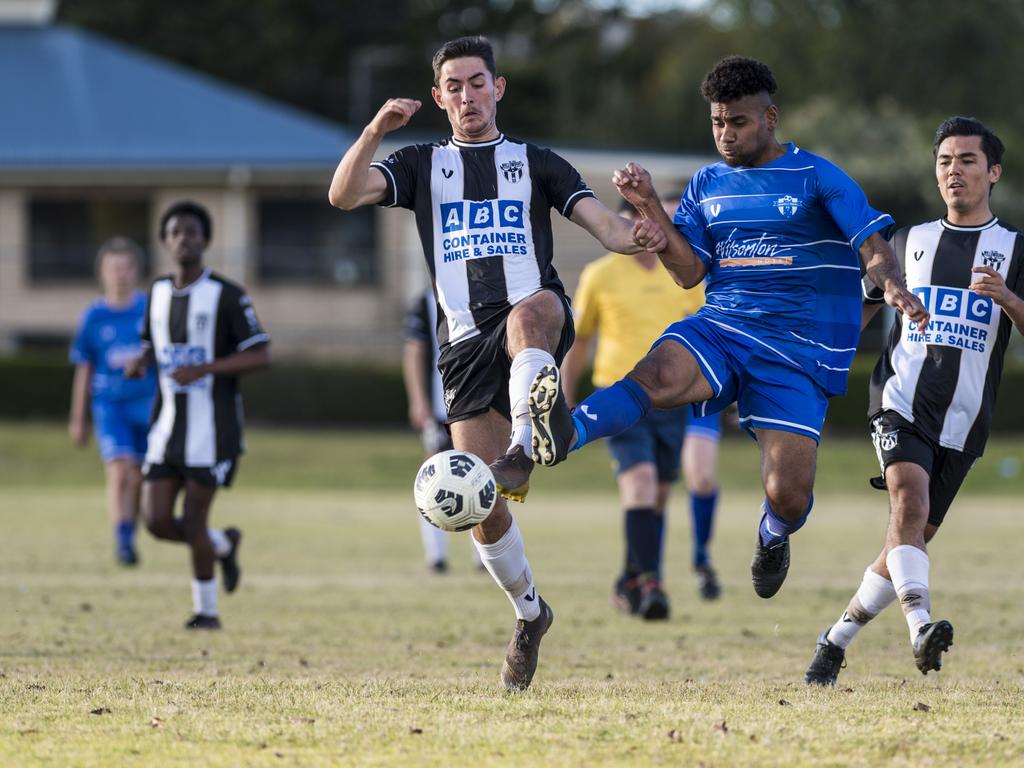 Lachlan Matthews (left) of Willowburn and Patrick Maneikera of Rockville Rovers in Toowoomba Football League Premier Men round 13 at Captain Cook reserve, Sunday, June 20, 2021. Picture: Kevin Farmer