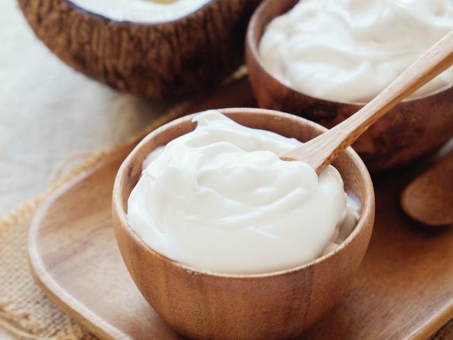 homemade organic coconut greek yogurt in wooden bowl