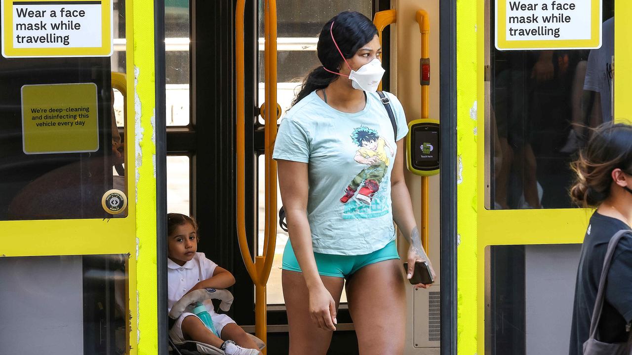 A commuter is seen wearing a face mask in Melbourne. Credit: NCA NewsWire / Ian Currie