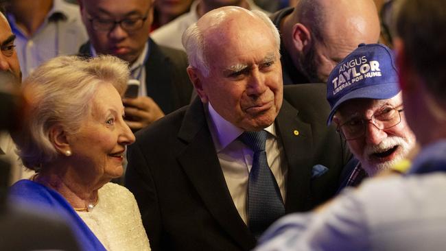 Former Prime Minister John Howard mingling upon arrival at the hotel. Picture: Nikki Short