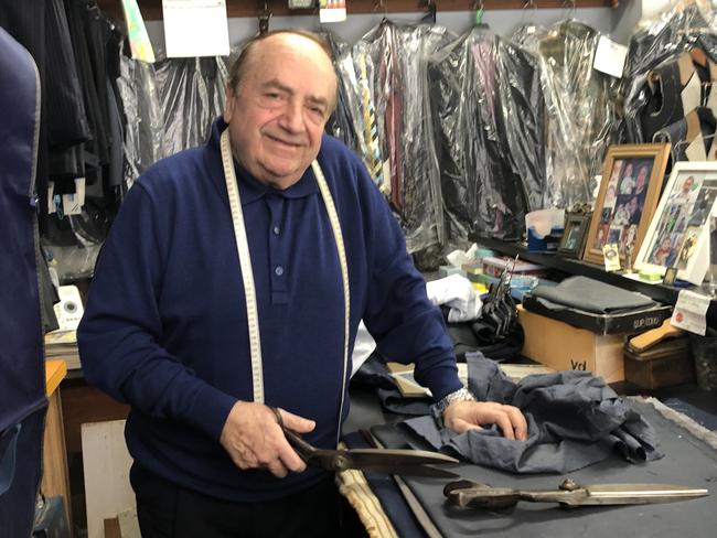 Still hard at work on Tuesday meeting his customers’ orders, Stefano Leface, 83, owner of Stefano International Tailor in Manly, set to permanently close its doors in coming weeks after 47 years in business. Picture: Jim O’Rourke