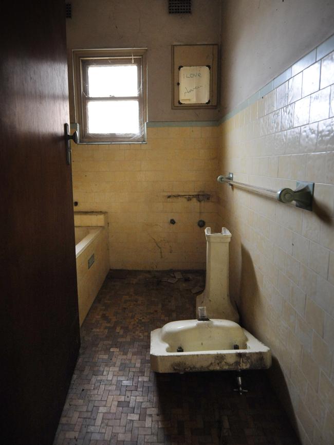 The bathroom facilities are broken and soaked in grime. Picture: Phil Rogers