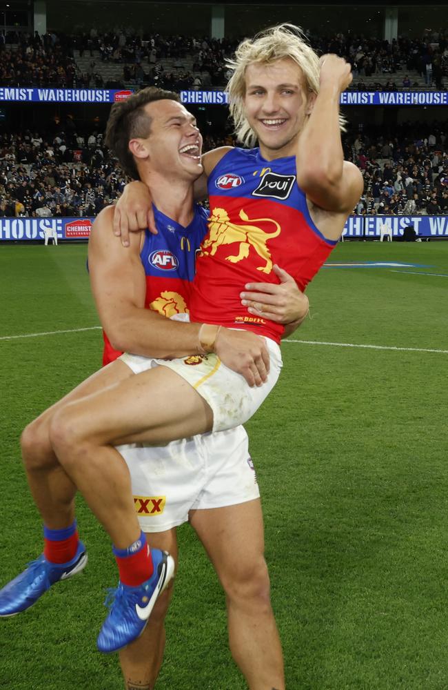 Cam Rayner and Kai Lohmann celebrate their win over Geelong. Picture: Darrian Traynor/AFL Photos/via Getty Images.