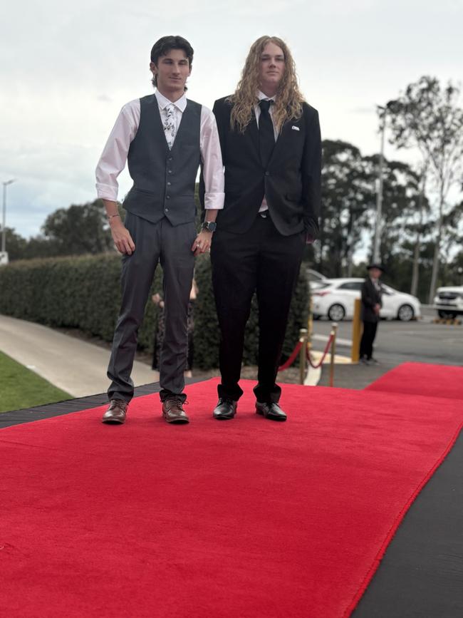 The students of Urangan State High School arriving at their formal.