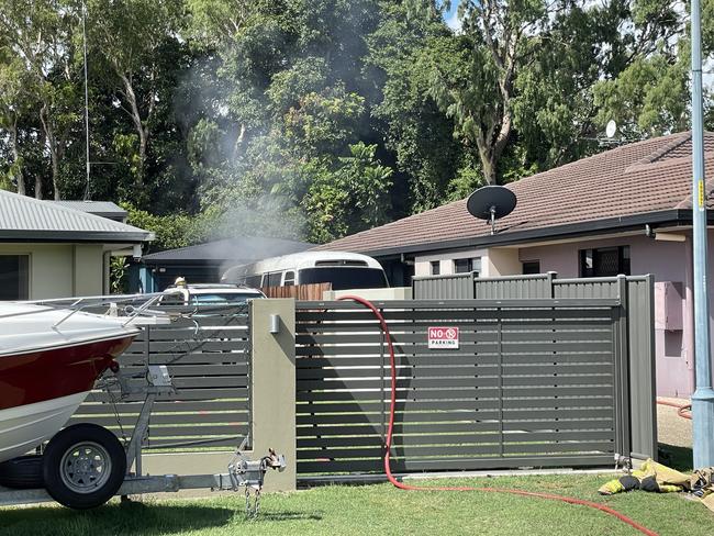 Mackay fire crews were called to a bus fire with a nearby by house under threat. Picture: Fergus Gregg