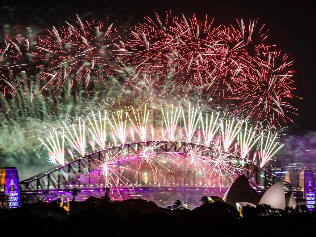 Fireworks light up the midnight sky over Sydney Harbour Bridge and Sydney Opera House during 2025 New Years celebrations in Sydney.