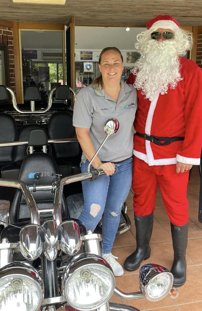 Belinda and Brent Watson dressed as Santa visited schools and accompanied the Urunga Rural Fire Service brigade on their annual community Santa run.