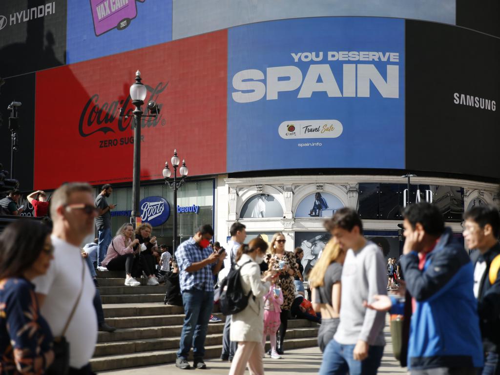 A travel ad for Spain on the billboards at Piccadilly Circus in London on August 1. Picture: Hollie Adams/Getty Images