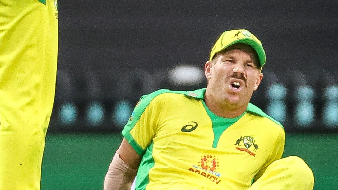 Australia's David Warner reacts after he suffered an injury.