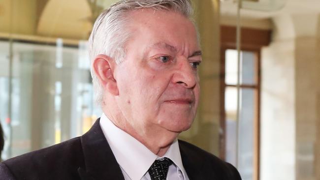 Former catholic priest and police chaplain John Patrick Casey arrives to Downing Centre Court complex in Sydney, Monday, August 14, 2017. Picture: Daniel Munoz