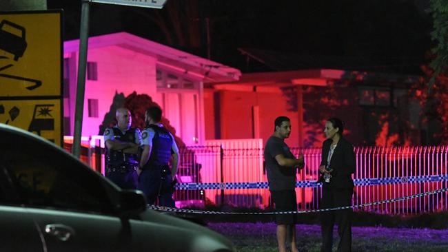 Police and onlookers at the scene of the stabbing on Livingstone Ave, Dharruk, in March 2018. Picture: Gordon McComiskie
