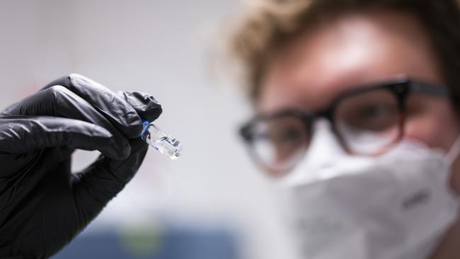 Chemical Analyst, Patrick test for substance for fentanyl at Australia’s first fixed pill-testing clinic in Canberra. Picture: Martin Ollman