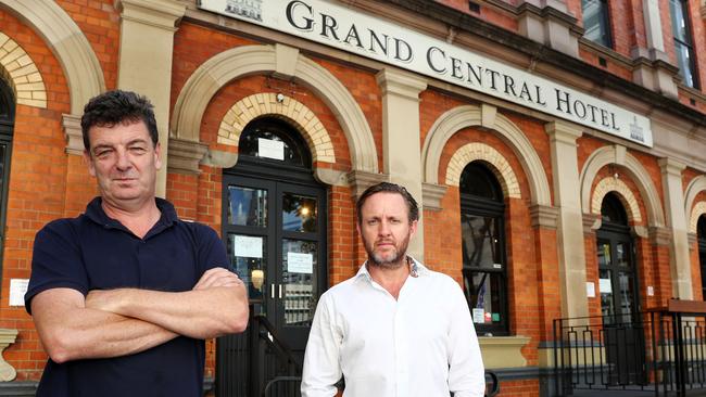 Pub owner Jaz Mooney, left, and Paul Fraser from CBRE at the Grand Central Hotel in Brisbane.