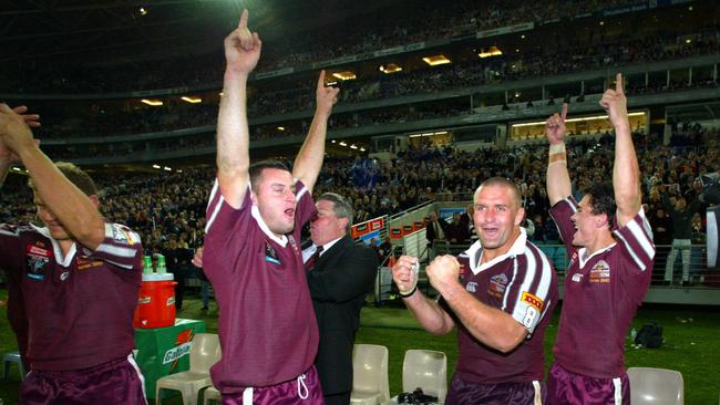 Maroons players celebrate the draw. Picture: David Kapernick