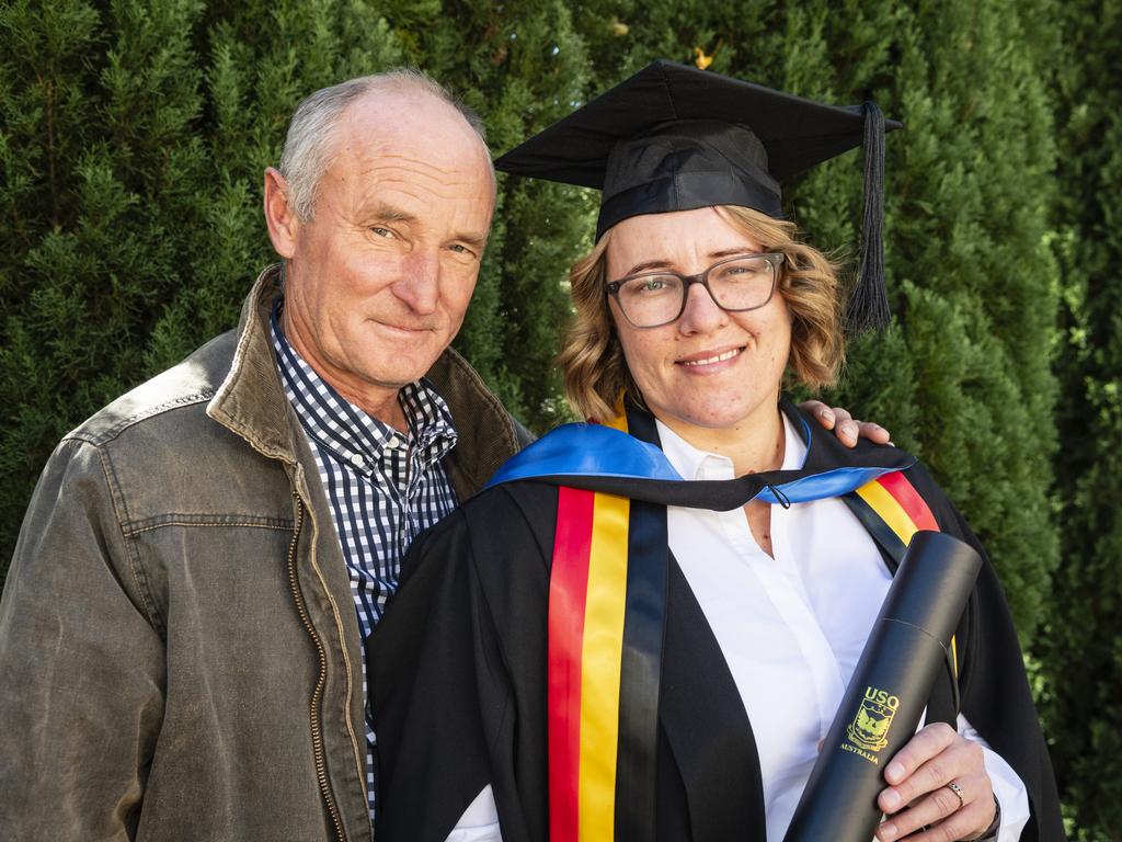 Bachelor of Science (Psychology) and Criminology and Criminal Justice graduate Jessica Monagle is congratulated by her dad Lionel Monagle at a UniSQ graduation ceremony at Empire Theatres, Tuesday, June 27, 2023. Picture: Kevin Farmer