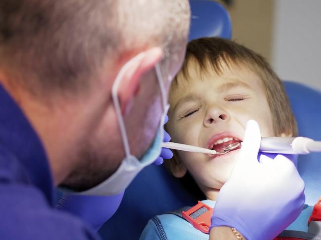 Generic photo of a young boy at the dentist. Picture: iStock