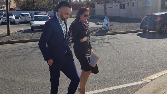 Clarence Yates, left, outside Christies Beach Magistrates Court with his lawyer, Stacey Carter. Picture: Sean Fewster.