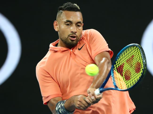 MELBOURNE, AUSTRALIA - JANUARY 25: Nick Kyrgios of Australia plays a backhand during his Men's Singles third round match against Karen Khachanov of Russia on day six of the 2020 Australian Open at Melbourne Park on January 25, 2020 in Melbourne, Australia. (Photo by Mike Owen/Getty Images)